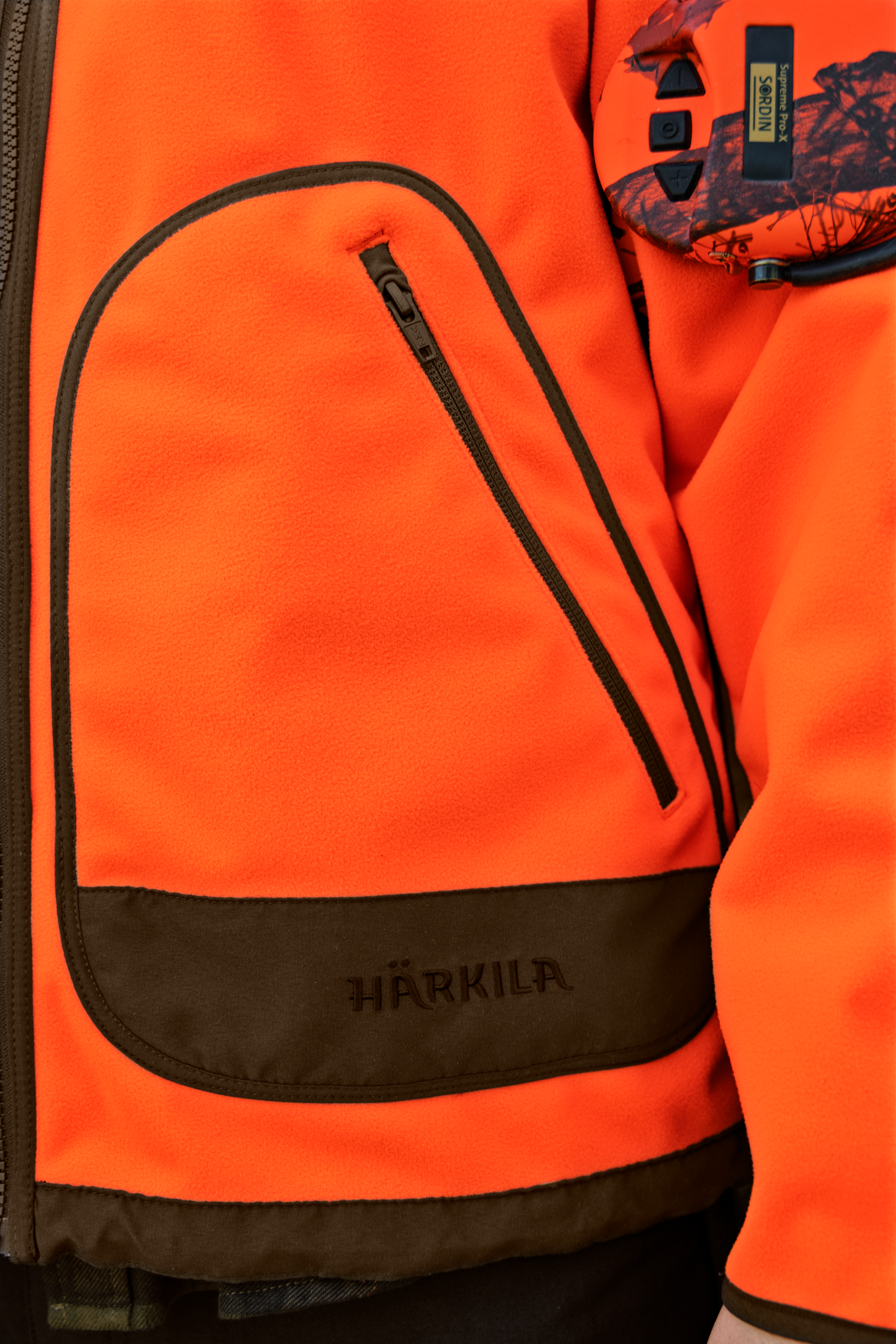 Kamko Blaze rev. fleece - Orange blaze/Willow green - Härkila