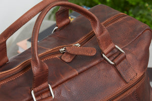 Corium Hunter holdall rejsetaske i brunt læder